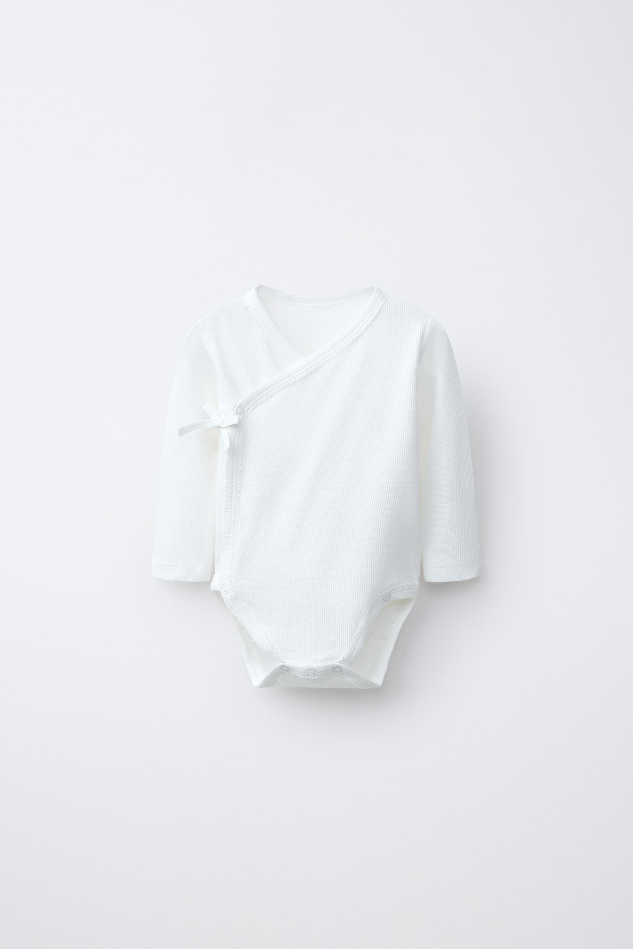 THREE-PACK OF RIBBED KIMONO NECK BODYSUITS